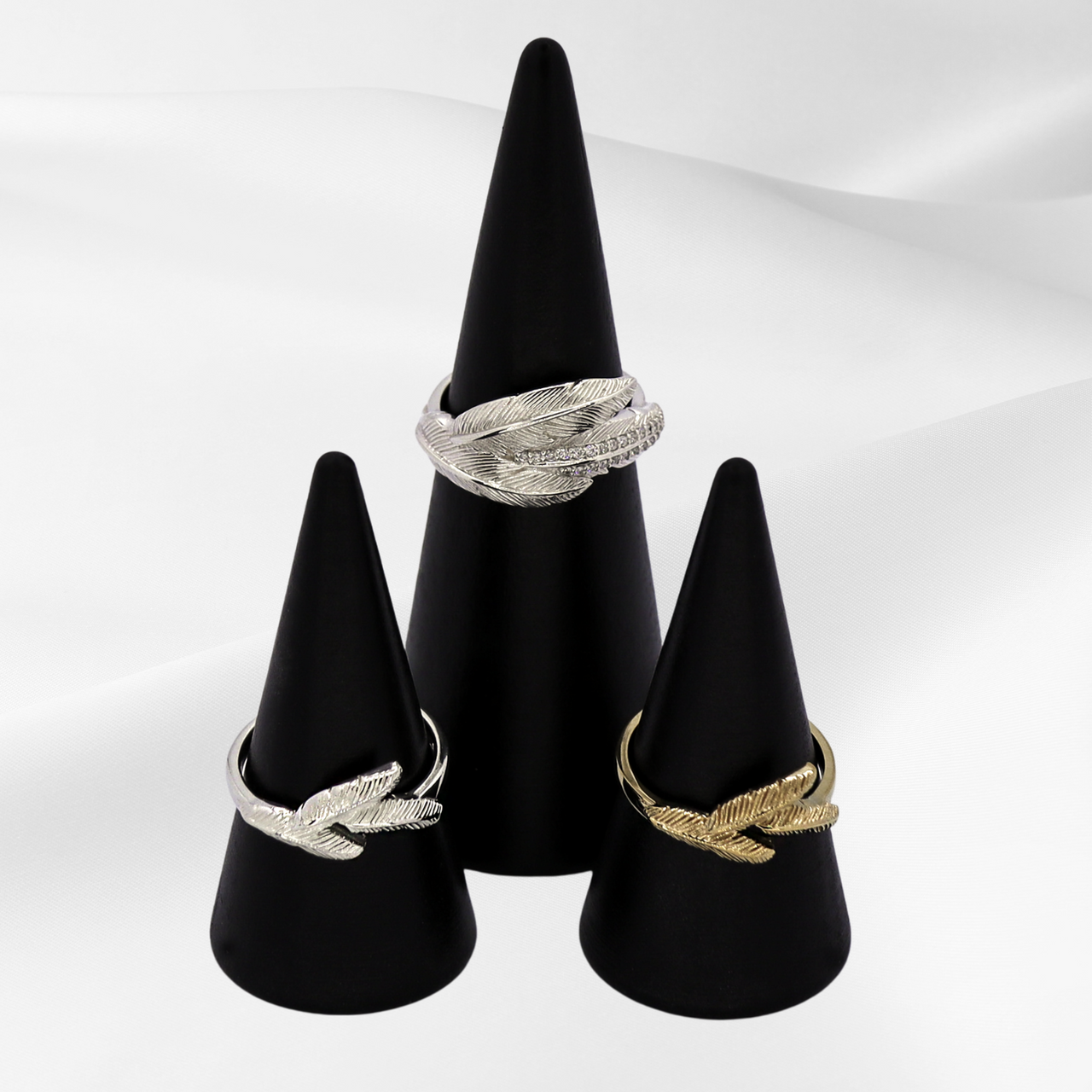 Soar with Joy™ front-facing view of all rings in collection including 14k yellow gold ladies ring, sterling silver ladies ring, and sterling silver with diamonds ladies ring.