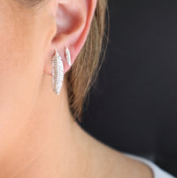 Thumbnail for Model wearing the Soar with Joy™ Petite Sterling Silver Earrings and Sterling Silver with Diamonds Earrings.
