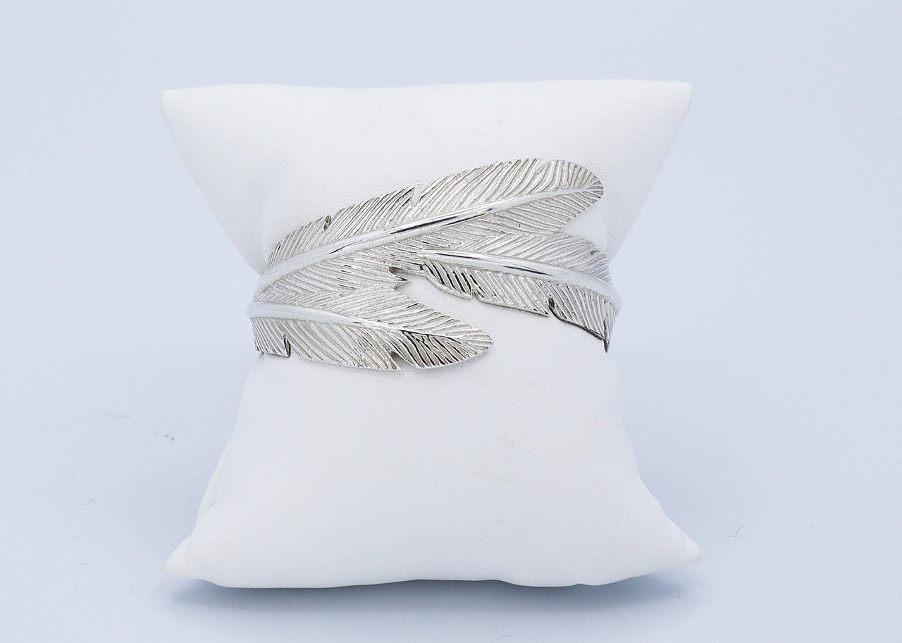 Soar with Joy™ Sterling Silver Cuff Bracelet with signature triple feather design.