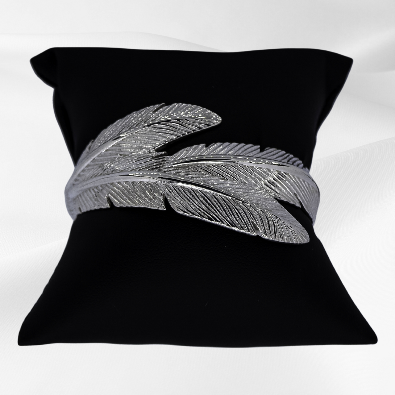 Soar with Joy™ Sterling Silver Cuff Bracelet with signature triple feather design.